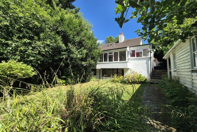 Detached bungalow for sale with extensive grounds