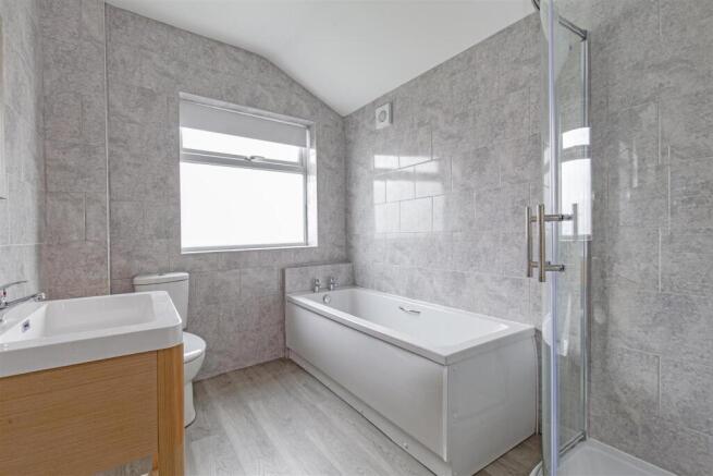 Fully Tiled Family Bathroom