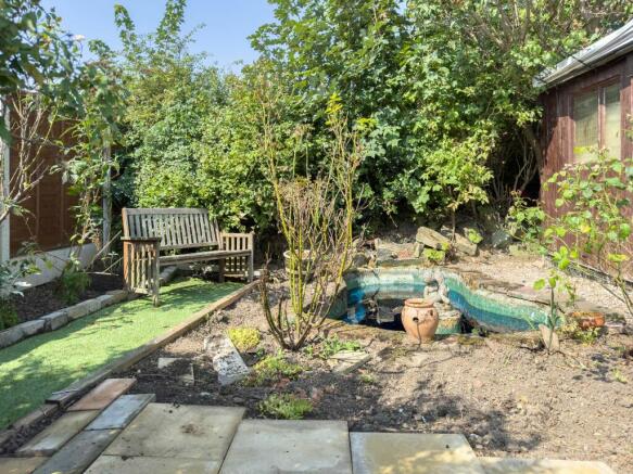 Relaxing rear garden with a pond