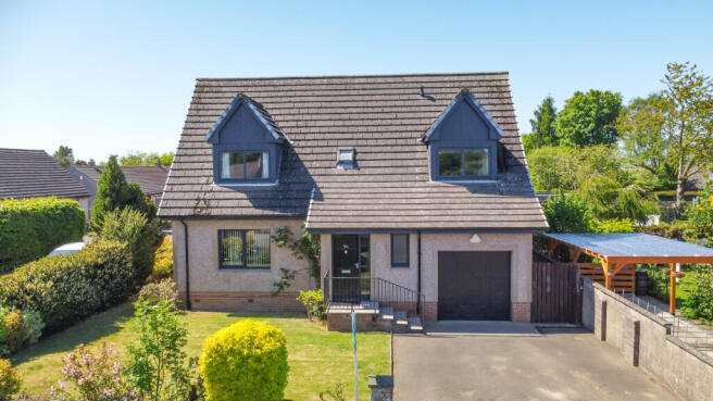 Front Elevation, Driveway, Gardens And Garage