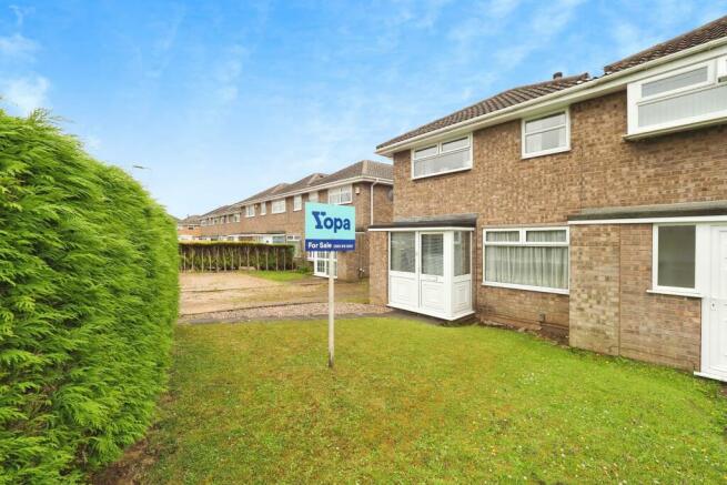 Great front view of No 6 - garden, private hedge, driveway and detached garage to the rear. (With potential)