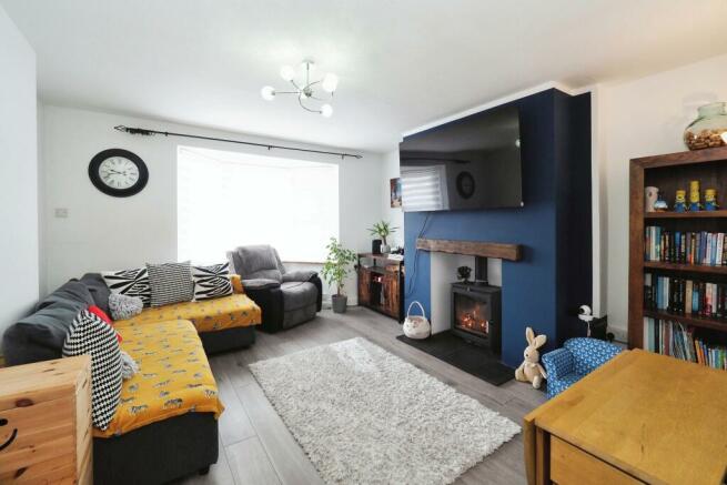 Stylish and Cosy Lounge with Bay and Log Burner