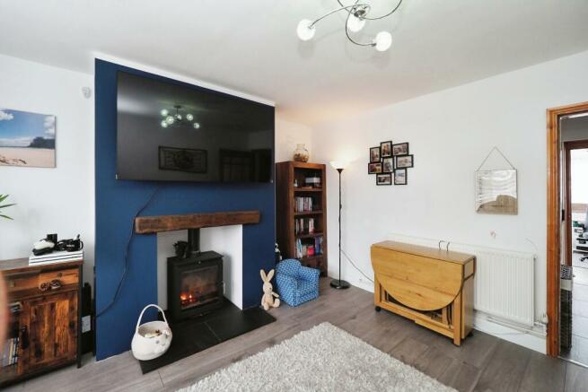 Stylish and Cosy Lounge with Bay and Log Burner