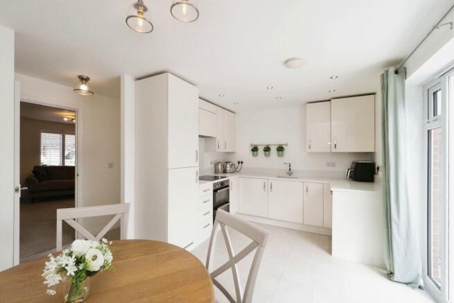 Soft and Contemporary Kitchen Dining with Great Natural Light