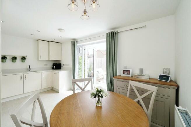 Soft and Contemporary Kitchen Dining with Great Natural Light