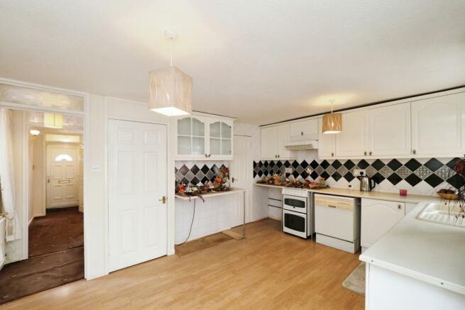 Very spacious Kitchen/Dining space with storage cupboard/pantry and conservatory