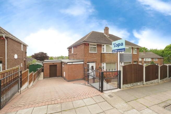 Fantastic plot with gated driveway, stairs to front door and front garden