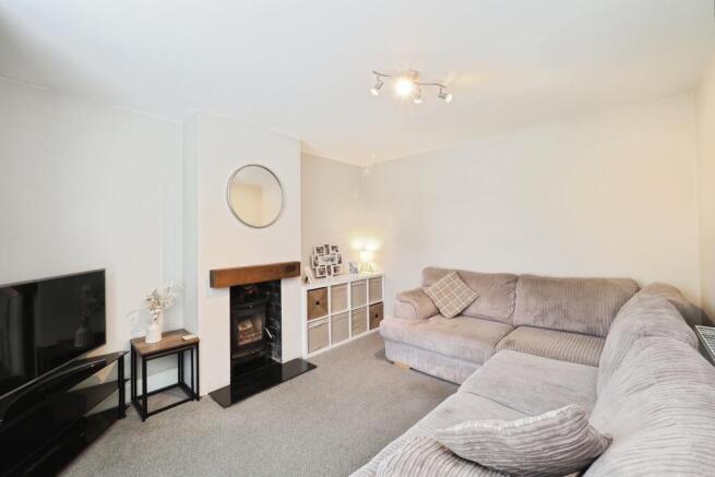 Modern Cosy Lounge with Log Burner
