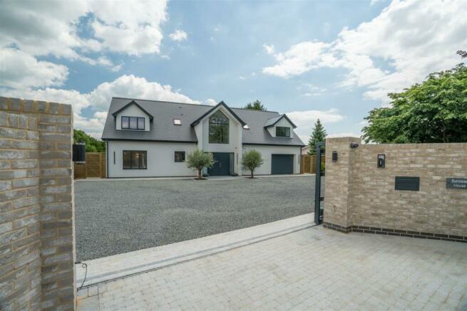 Electric Sliding Wooden Clad Gate to Driveway