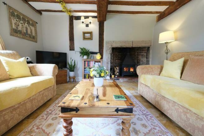 Warm sitting room with log burner