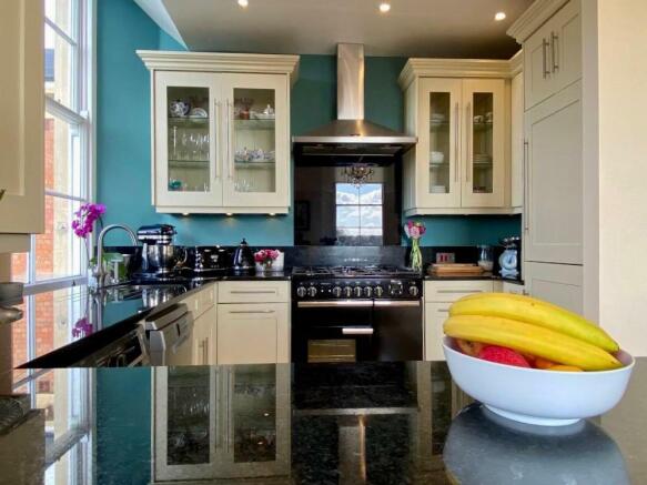 Open plan kitchen with breakfast bar