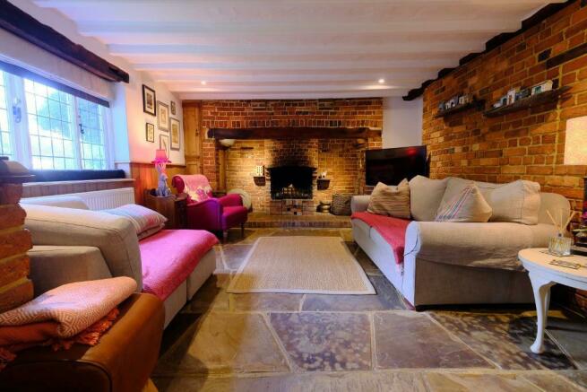 Sitting room with inglenook fire place