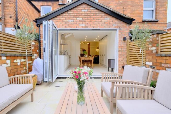 Bifold doors from kitchen to courtyard
