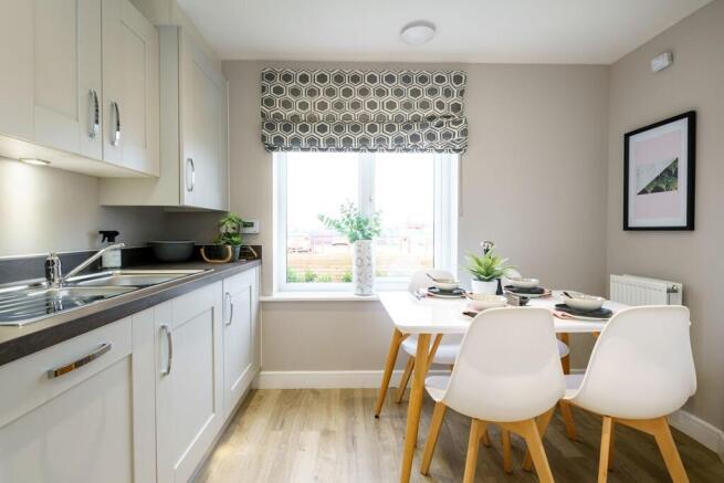 A bright and airy kitchen and breakfast area