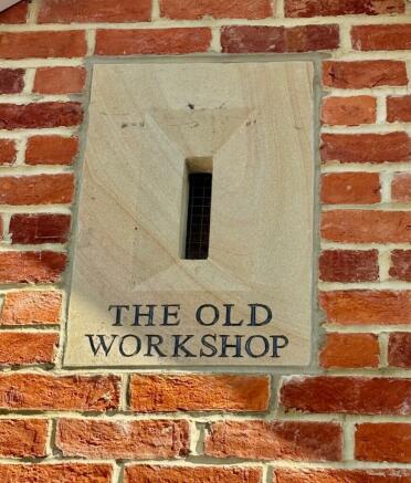Old workshop plaque