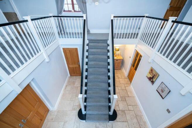 Hallway/gallery staircase