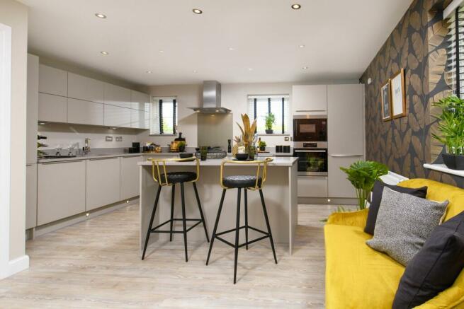 Alderney open plan kitchen with breakfast island and seating area