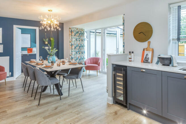 Open plan kitchen dining room in the Holden 4 bedroom home