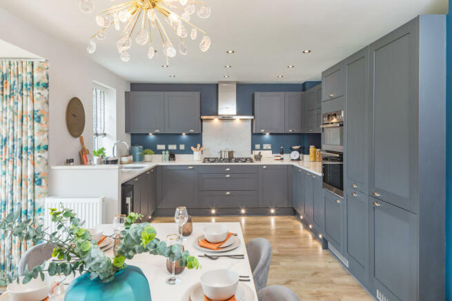 Open plan kitchen dining room in the Holden 4 bedroom home