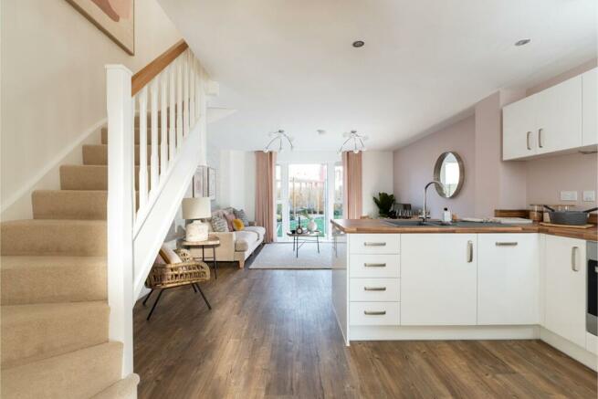 The light open plan kitchen/living space is ideal for entertaining
