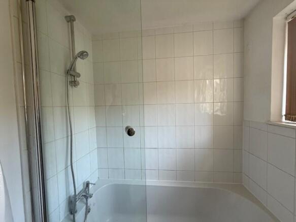 P Shaped Bath with Shower Over