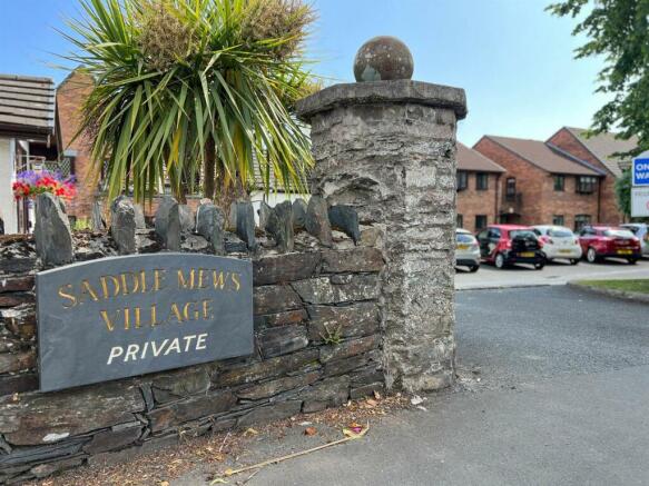 97 Saddle Mews entrance sign.jpg
