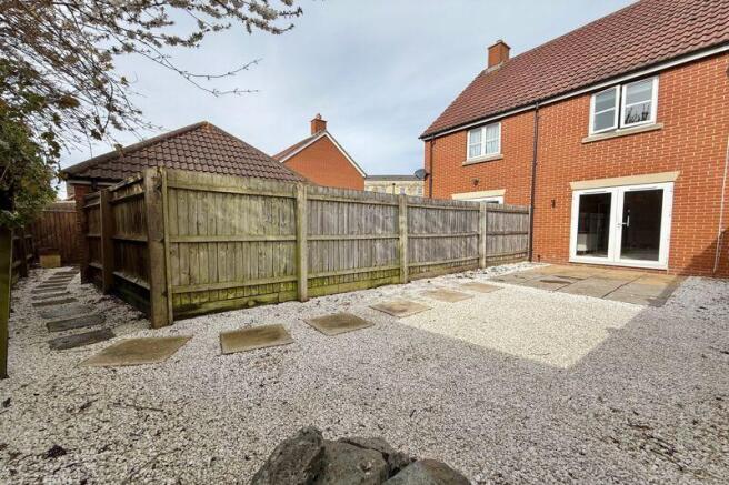 Rear Garden to Garage