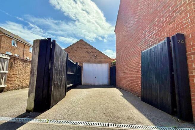 Gated Drive to Garage