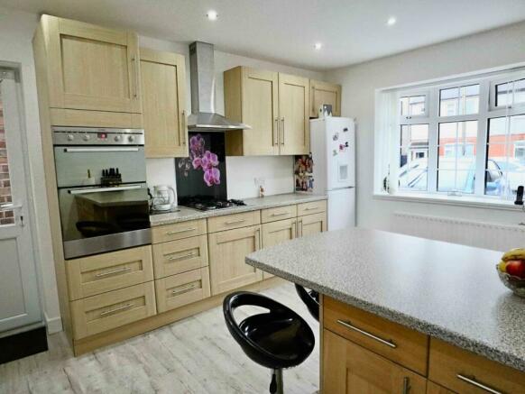 Spacious modern fitted breakfast kitchen (through)