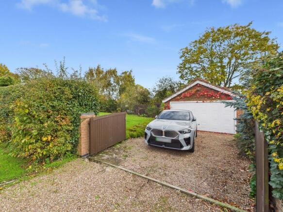 Second Driveway and Detached Double Garage