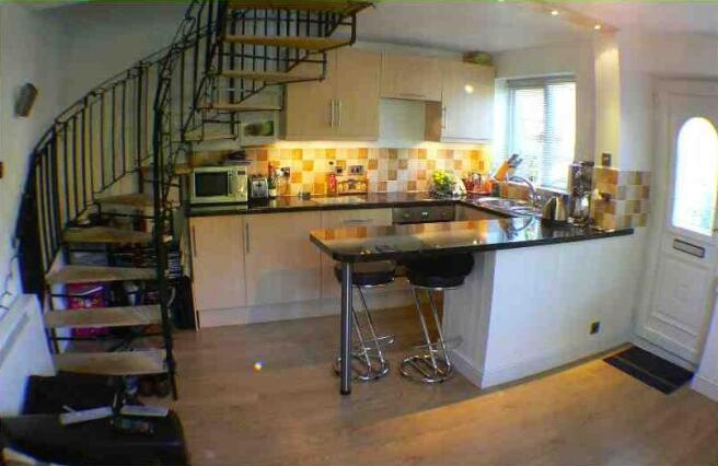 Staircase and kitchen