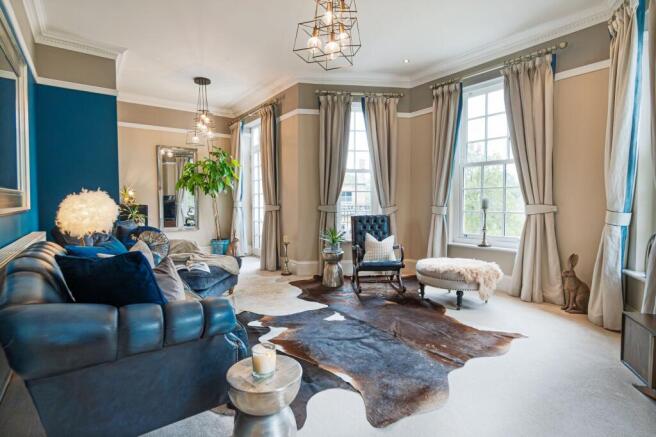 Spacious unique Formal lounge with walk out patio doors to garden