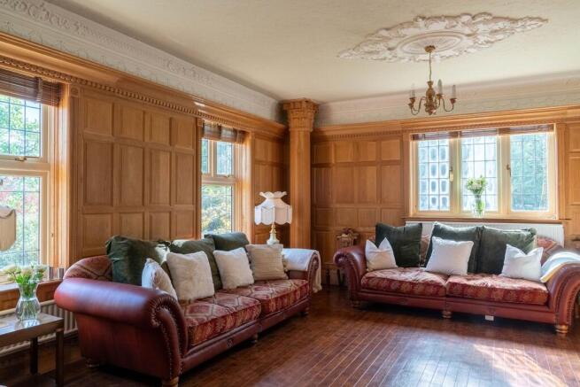 Large oak paneled lounge