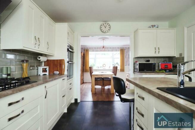 KITCHEN INTO DINING ROOM