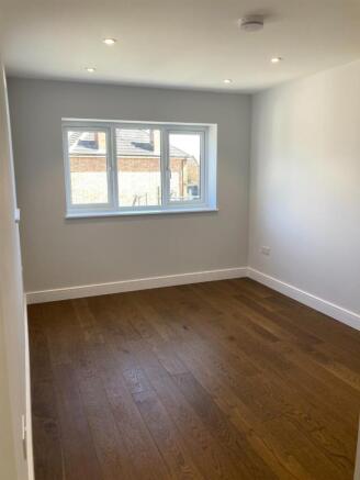 Bedroom 1 back.jpg
