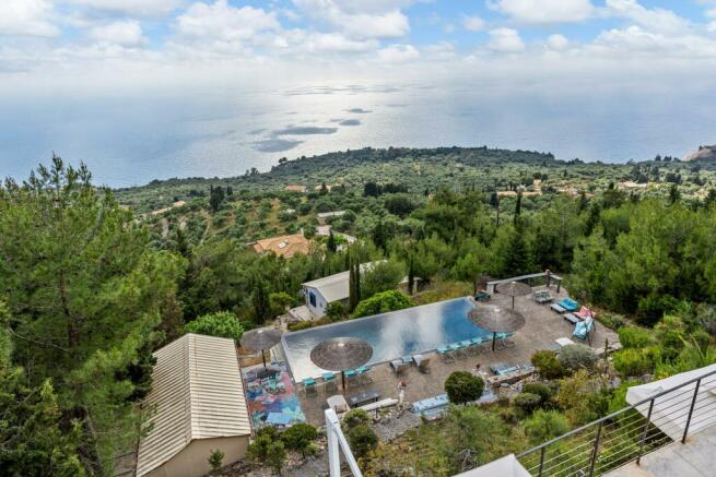 aerial view of hotel, olive groves and sea