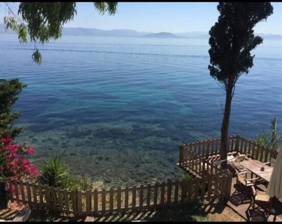 balcony and steps down to the sea
