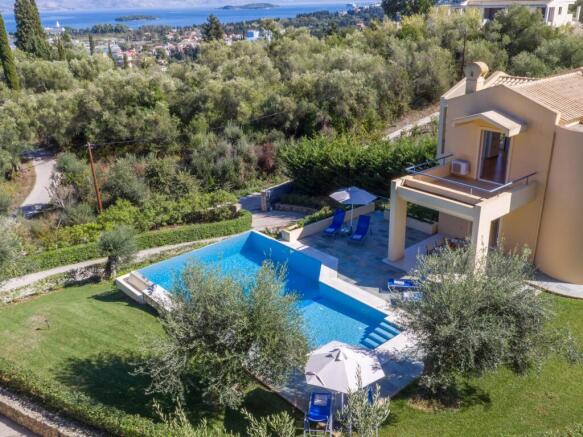 Side shot of pool and house