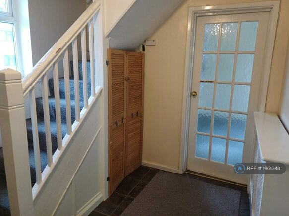 Downstairs Landing With Under Staircase Storage