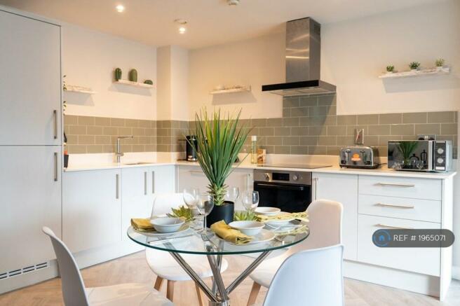 Open Plan Kitchen And Living With Stone Worktops