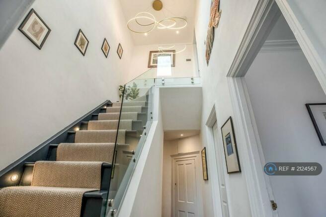 Hall & Staircase To Master Suite