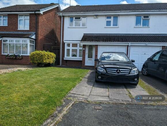 Front Driveway And Garage