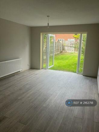 Lounge With French Doors To Garden