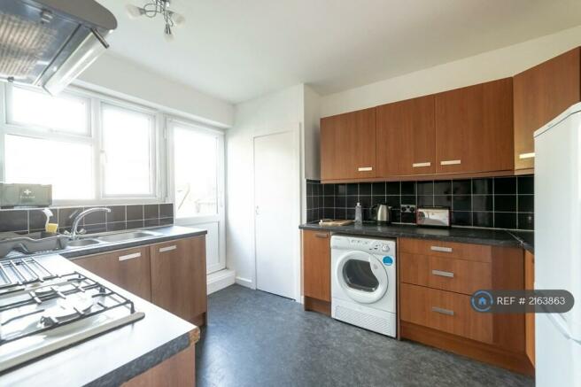 Kitchen With Lots Of Storage And Tumble Dryer 