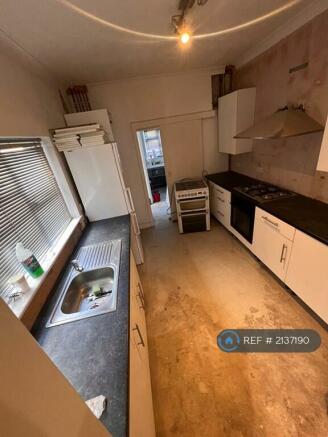 Kitchen Awaiting New Flooring And Finishing