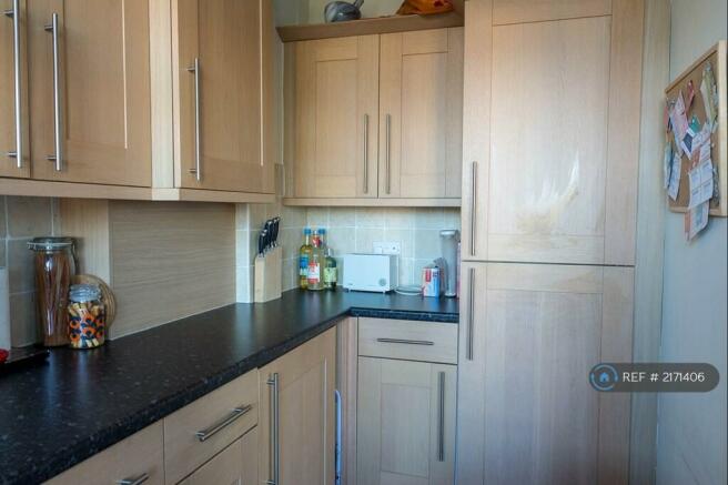 Kitchen With Fridge/Freezer And Washer Dryer