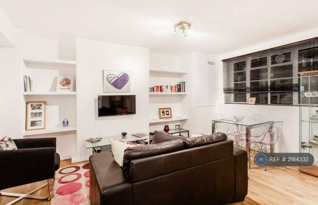 Living Room, Including Tv, Sofa And Dining Table