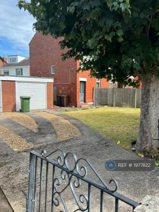 Front Door Entrance And Parking Space