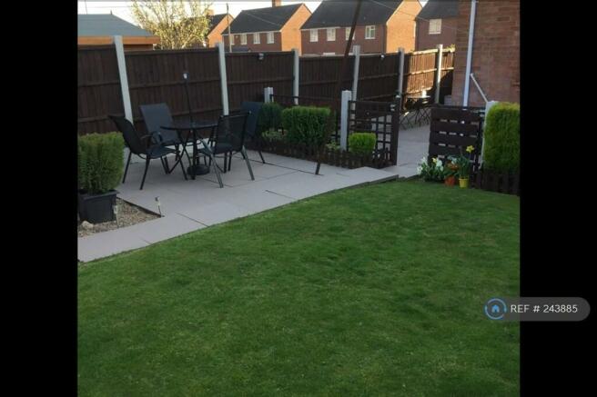 Lawned Garden With Raised Patio