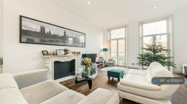 Beautiful Open Plan Living Area With High Ceilings